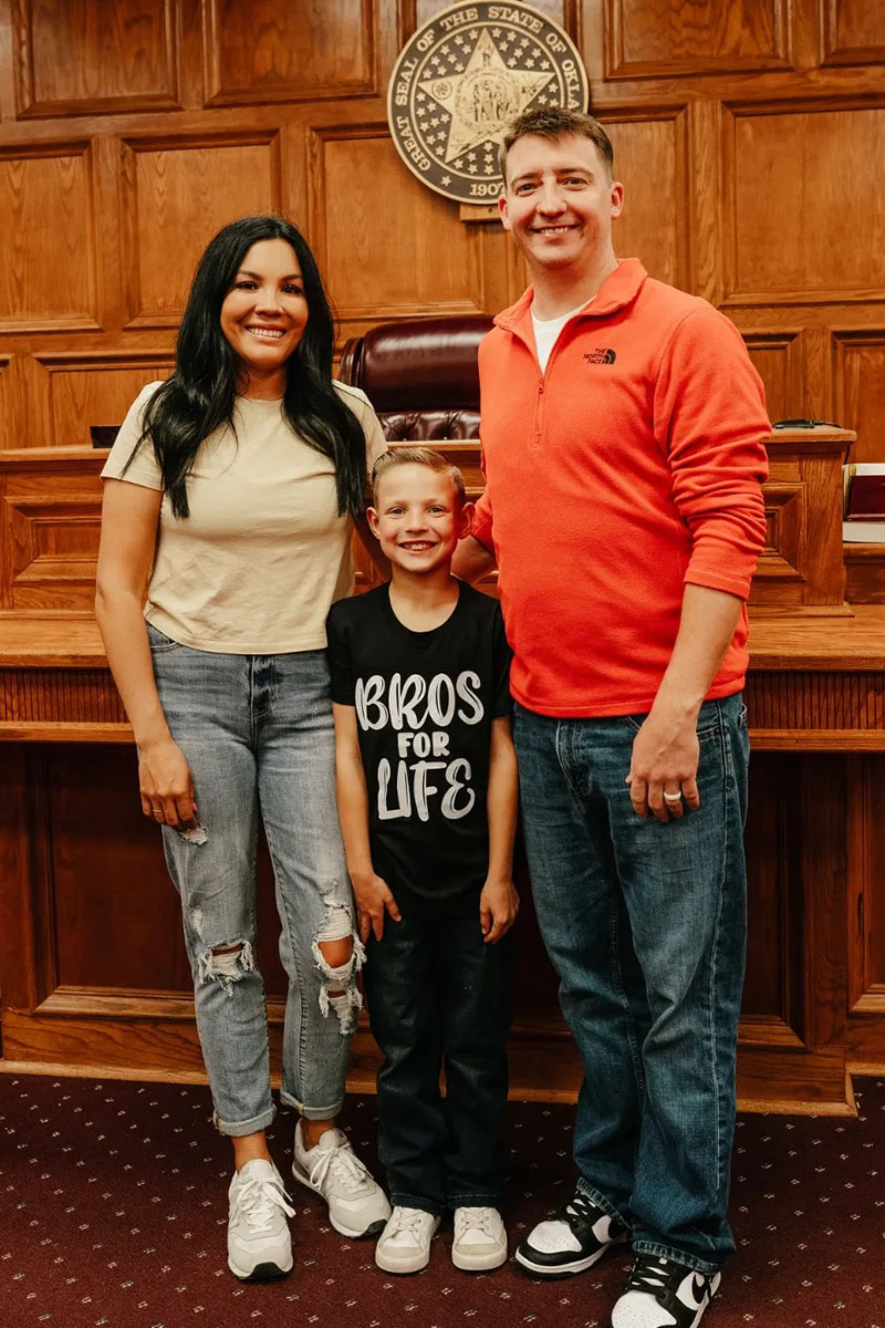 Photo of Krysten Brown, her Husband, and Payton her son.
